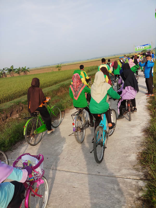 Ratusan Pelajar Bersepeda Toer de Sawah Bungaraya Siak